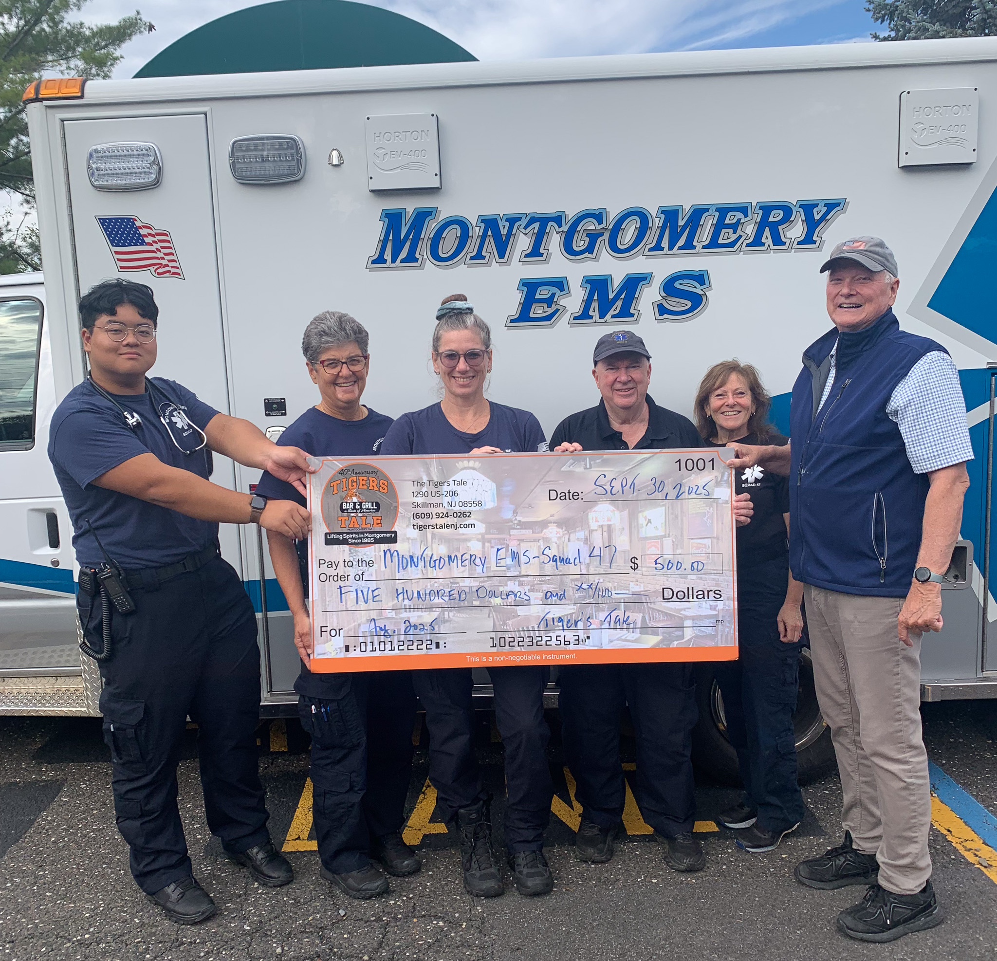 Montgomery EMS crew with community members