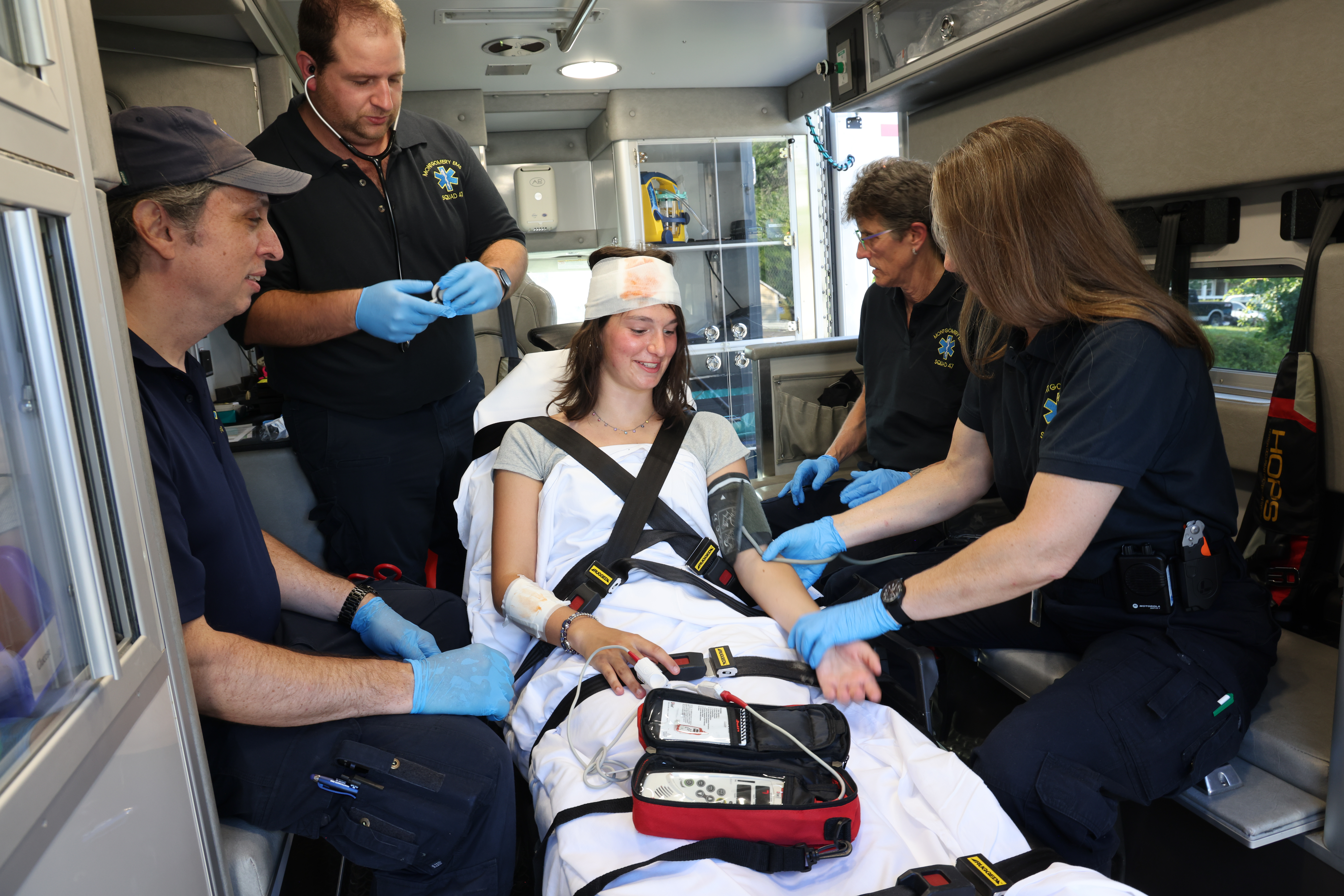 Montgomery EMS volunteers providing emergency care to a patient in Montgomery Township